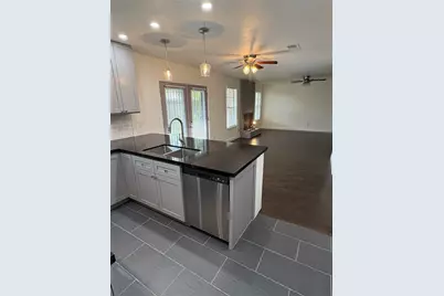 9006 Winding River Drive, Houston, TX 77088 - Photo 13