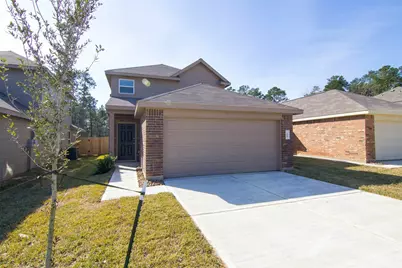 393 North Meadows Drive, Willis, TX 77378 - Photo 1