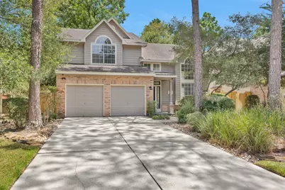 84 E Lakeridge Drive, The Woodlands, TX 77381 - Photo 1