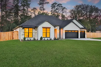 351 Louvenia Court, Pinehurst, TX 77362 - Photo 1