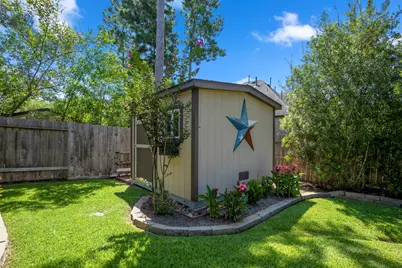 219 Chirping Squirrel Court, Pinehurst, TX 77362 - Photo 33
