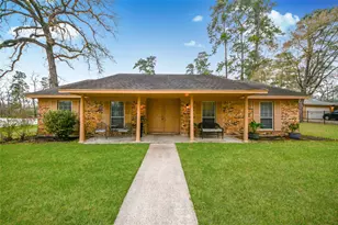 203 Ridgewood Dr, Oak Ridge North, TX 77386 - Photo 1