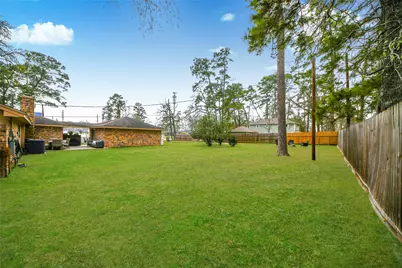 203 Ridgewood Drive, Oak Ridge North, TX 77386 - Photo 35