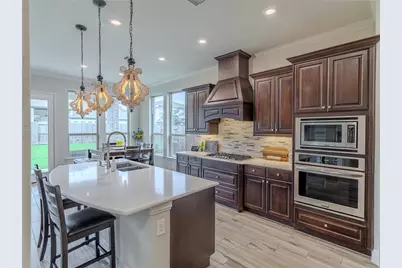 10923 Sunnydale Ridge Lane, Cypress, TX 77433 - Photo 11