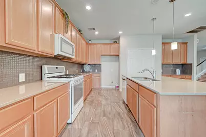 8707 Cimarron Falls Court, Magnolia, TX 77354 - Photo 11