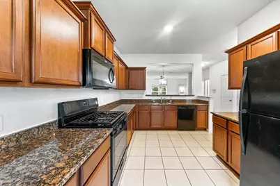 7675 Dragon Pearls Lane, Conroe, TX 77304 - Photo 7