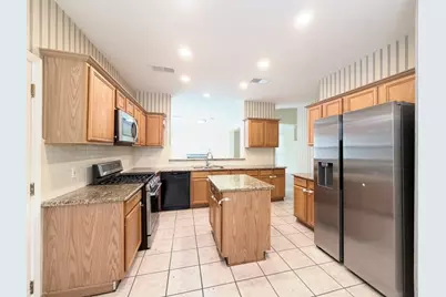 12211 Meadow Crest Court, Meadows Place, TX 77477 - Photo 9