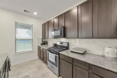 11662 Bodark Valley Lane, Houston, TX 77038 - Photo 15