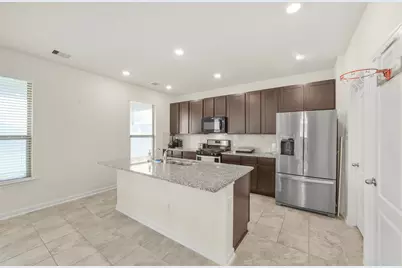 11662 Bodark Valley Lane, Houston, TX 77038 - Photo 13