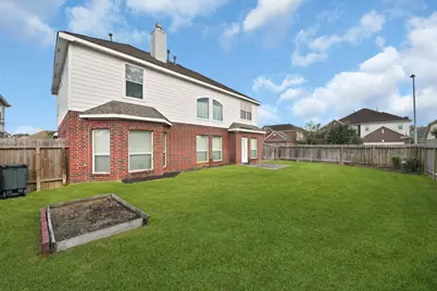 18123 Memorial Falls Drive, Tomball, TX 77375 - Photo 35