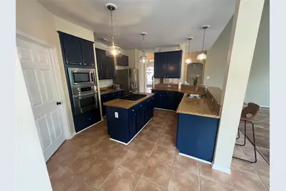 26 Merit Woods Place, The Woodlands, TX 77382 - Photo 11