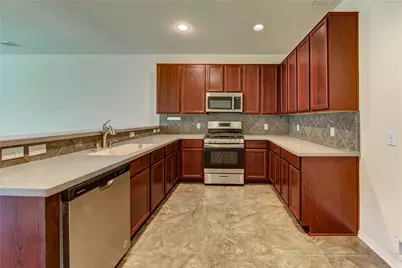 14927 Vinegrove Falls Court, Cypress, TX 77433 - Photo 9