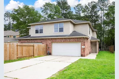 100 Artesian Way, New Caney, TX 77357 - Photo 1