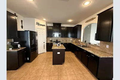 10122 Mariposa Stream Court, Houston, TX 77044 - Photo 7