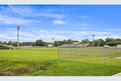 1050 Tarkington Timbers Drive, Cleveland, TX 77327 - Photo 33