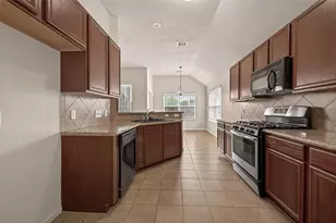 11719 Bollinger Park Ct, Houston, TX 77047 - Photo 9