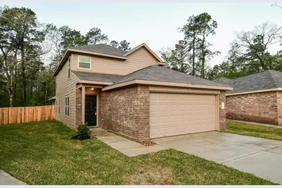 433 North Meadows Drive, Willis, TX 77378 - Photo 1