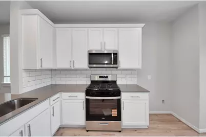 12527 Colchester Creek Court, Houston, TX 77047 - Photo 11