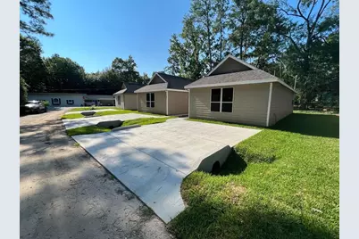 9595 Darkwood Street, Willis, TX 77318 - Photo 1