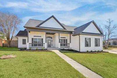 5437 Edgewater Court, Willis, TX 77318 - Photo 1