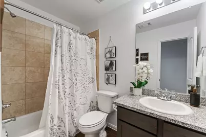 15022 Sorrento Bay Court, Willis, TX 77318 - Photo 17