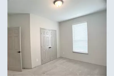 8656 Hollyoaks Creek Lane, Houston, TX 77063 - Photo 25