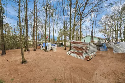 1040 County Road 5007, Cleveland, TX 77327 - Photo 31