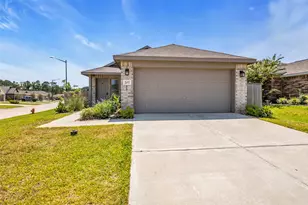 207 River Grv Ct, Willis, TX 77378 - Photo 1