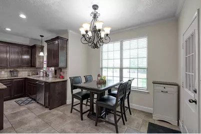 9766 Twin Shores Drive, Willis, TX 77318 - Photo 11