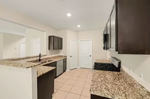 7711 Boulder Sunstone Ln, Conroe, TX 77304 - Photo 11