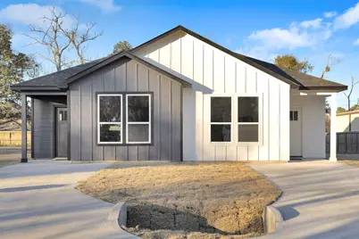 104 Runnels Street, Willis, TX 77378 - Photo 1