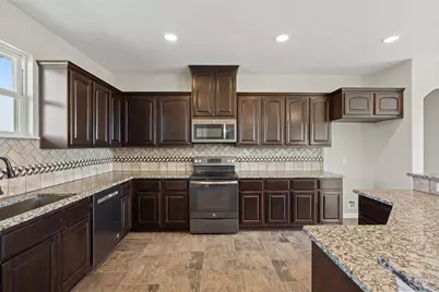 10015 S Redfish Drive, Hitchcock, TX 77563 - Photo 7