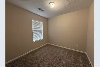 5525 N Buffalo Circle, Willis, TX 77378 - Photo 13