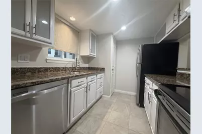 1801 Stoney Brook Drive #106, Houston, TX 77063 - Photo 13