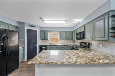 4058 Sherwood Street E, Kingwood, TX 77339 - Photo 9