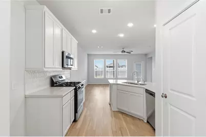 7819 Wyndham Harbor Court, Richmond, TX 77407 - Photo 13