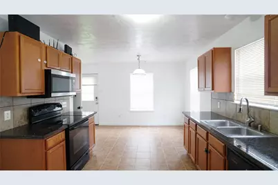4403 Sprangletop Avenue, Baytown, TX 77521 - Photo 13