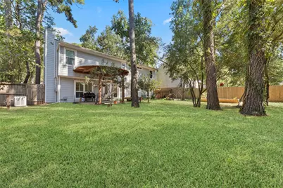 218 E Rainbow Ridge Circle, The Woodlands, TX 77381 - Photo 29