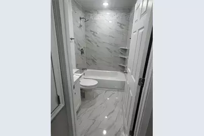 22418 E Shorewood Loop E, Houston, TX 77336 - Photo 11