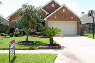10135 Lazy Lagoon, Houston, TX 77065 - Photo 1