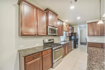 7702 Mona Key Court, Richmond, TX 77407 - Photo 11