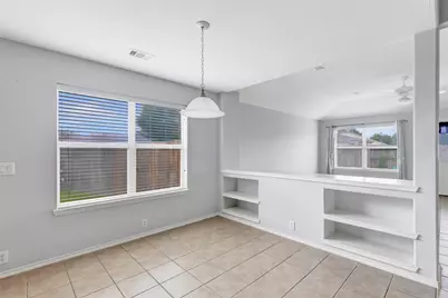4601 Woodspring Acres Court, Houston, TX 77345 - Photo 11