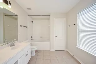 9403 Coatsworth Dr, Sugar Land, TX 77498 - Photo 17