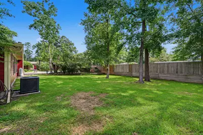 10985 Woods Lane, Cleveland, TX 77328 - Photo 25