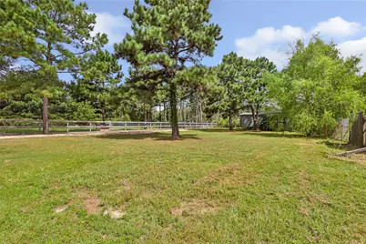 1031 County Road 3404, Cleveland, TX 77327 - Photo 13