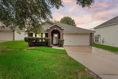 14099 Running Bear Drive, Willis, TX 77378 - Photo 1