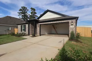 989 Garden Path Dr, Willis, TX 77378 - Photo 9