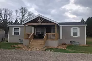 10932 Blackland Rd, Willis, TX 77318 - Photo 1