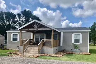 10932 Blackland Rd, Willis, TX 77318 - Photo 1