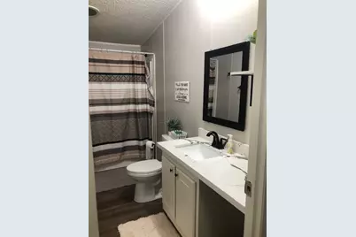 10932 Blackland Road, Willis, TX 77318 - Photo 13
